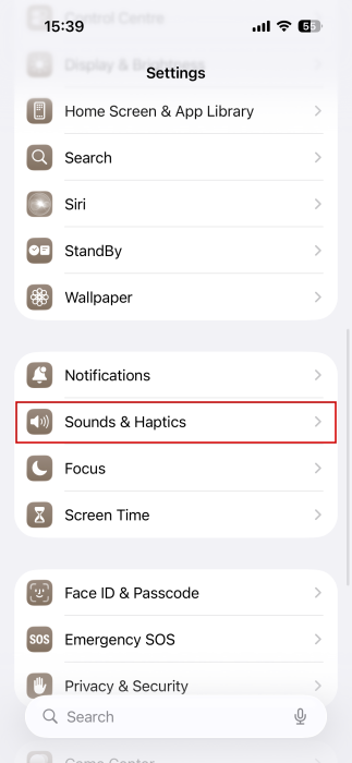 Navigating to "Sounds & Haptics" in iPhone Settings.