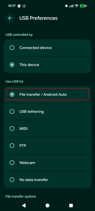 Switching to "File transfer" option in USB Preferences on Android. 