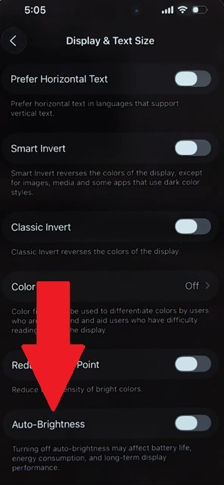 Turning on Auto-Brightness on iPhone.