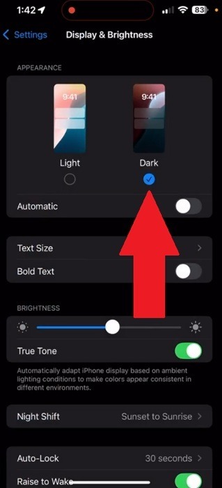 Enable dark mode on iPhone.
