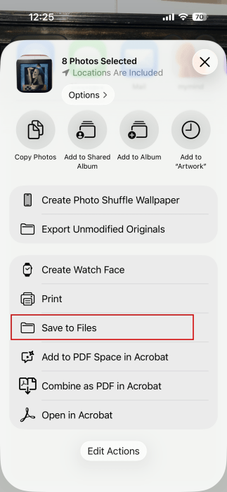 Selecting "Save to Files" on group of photos on iPhone. 