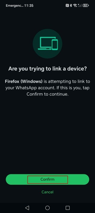 Pressing "Confirm" button to link Android phone with WhatsApp Web via phone number. 