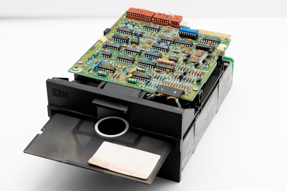 The IBM 305 RAMAC stayed in production until 1961, weighed more than a ton, stored five million characters on fifty spinning platters, and still drew customers because the alternative was a room full of punched cards