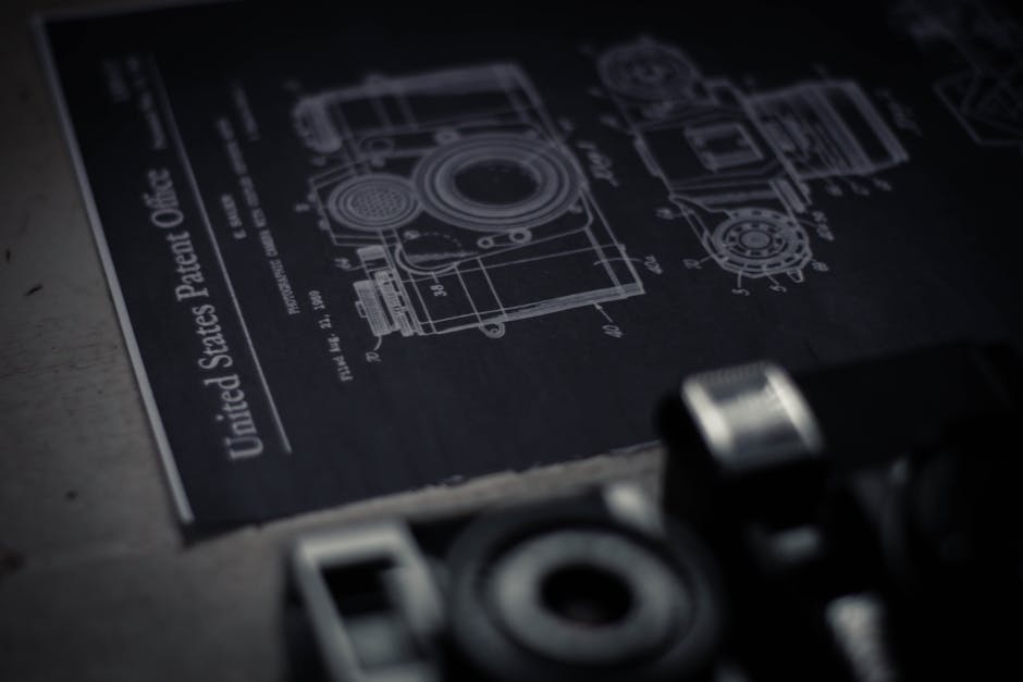 Black and white of operation manual with parts of modern photo camera and directions for users on table in room