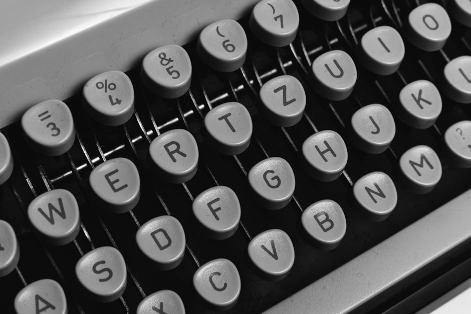 Every year, roughly two billion new smartphones, laptops, and tablets ship with a key arrangement designed in the 1870s to prevent slender metal arms from colliding inside a machine that has been obsolete for decades, a piece of 19th-century mechanical engineering quietly embedded in the muscle memory of about five billion people.