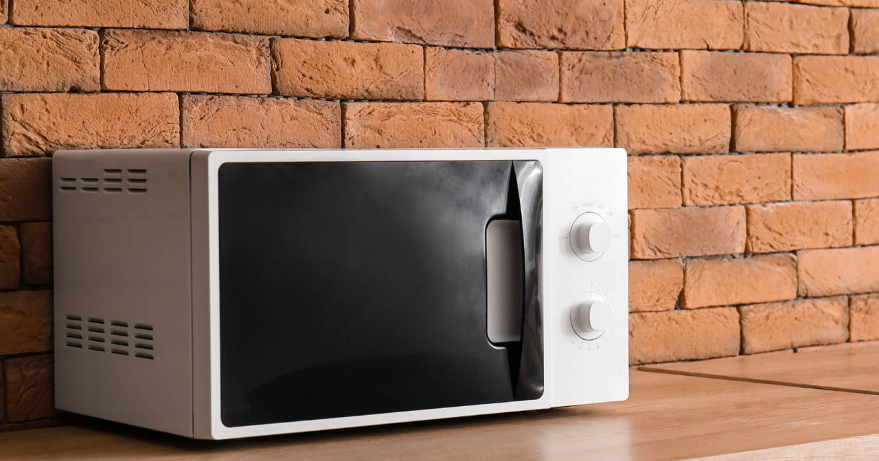 A microwave oven works because water molecules have a slight positive and negative end — the magnetron flips an electric field 2.45 billion times a second, and the molecules twist back and forth so fast the friction becomes heat