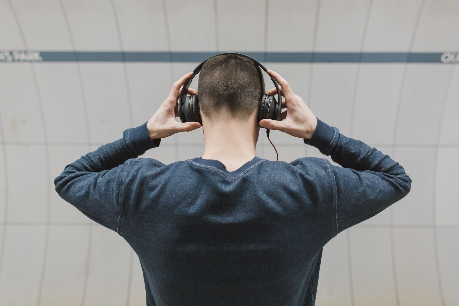 Noise-cancelling headphones don't block sound, they generate its exact mirror image — a microphone samples the incoming wave, and the driver plays an inverted copy that meets it and cancels to near silence