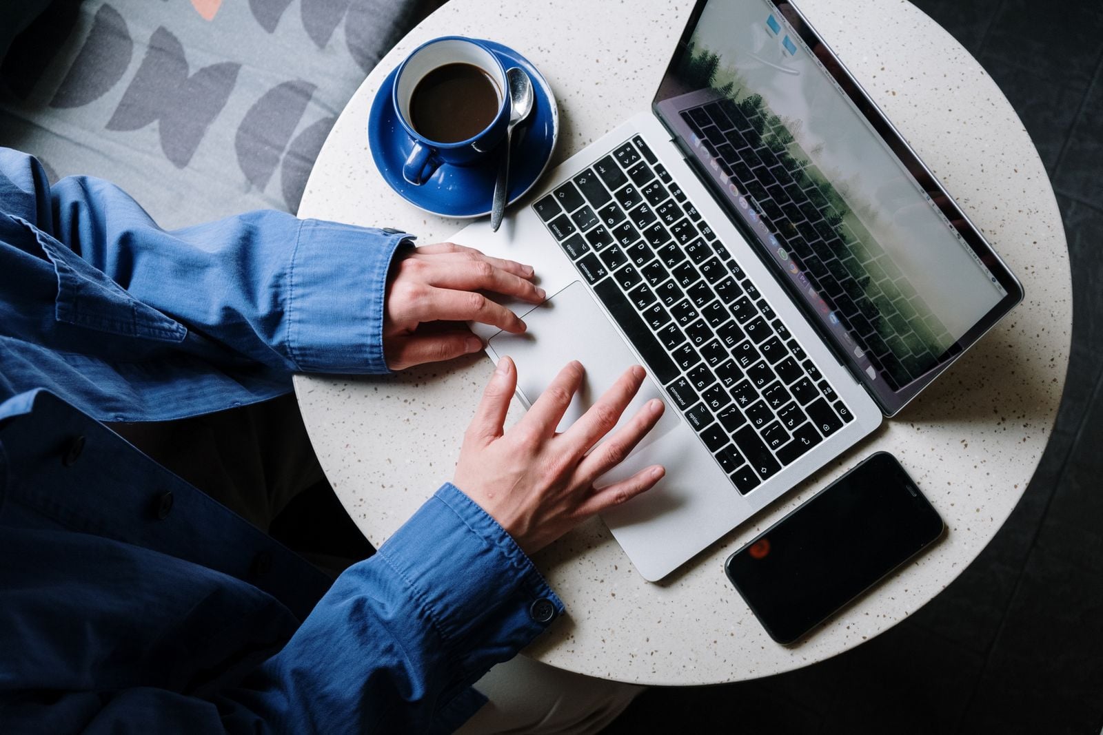 Wi-Fi doesn't actually slow down when a café gets crowded — the signal is fine, but every device has to wait its turn to speak on the same frequency, and the polite queuing is what you feel as lag