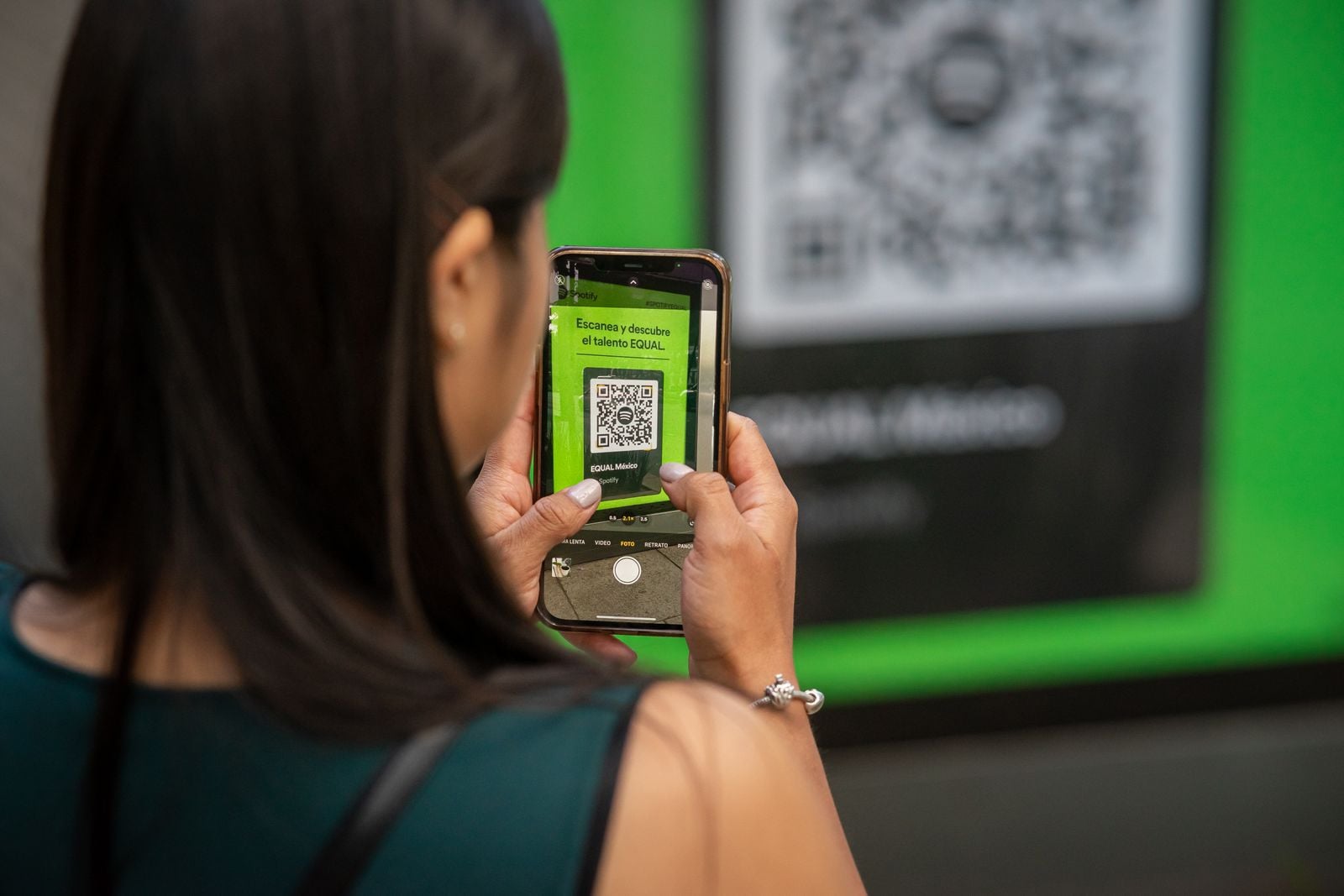 Every QR code hides three larger squares in its corners — they let a scanner find the code at any angle, and the pattern also carries enough redundancy to still read after roughly 30 per cent of the code is damaged or covered